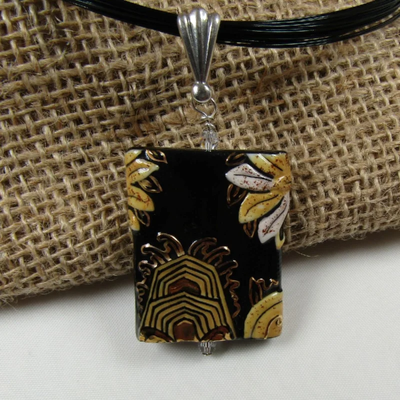 Handmade Artisan Black and Gold Pendant on Multi-strand Black Necklace